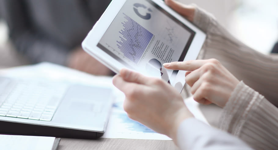 People looking at a tablet